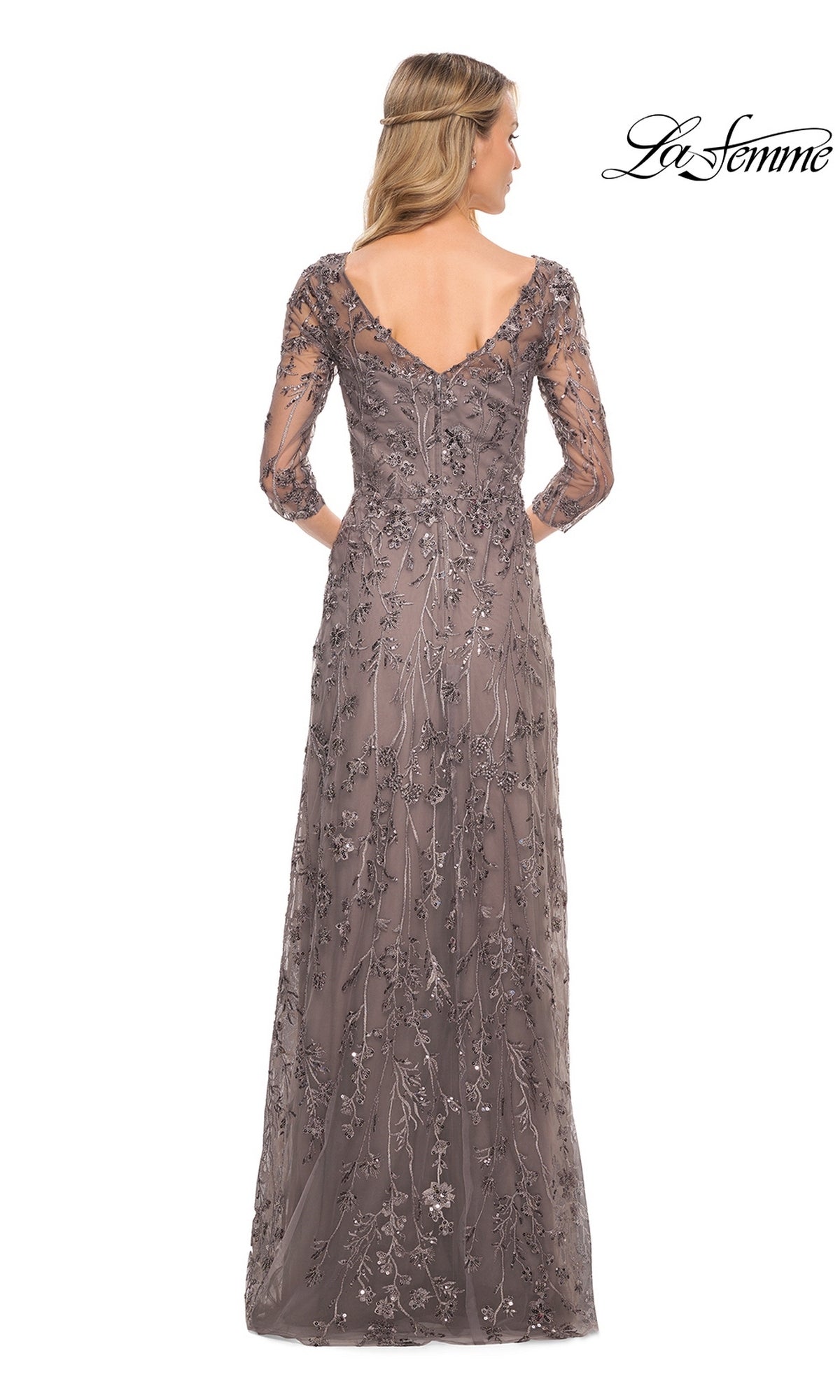 Back view of a Long Formal Dress: La Femme 29994, featuring a floor-length taupe sheer-sleeve design with three-quarter sleeves and sequined floral embroidery.